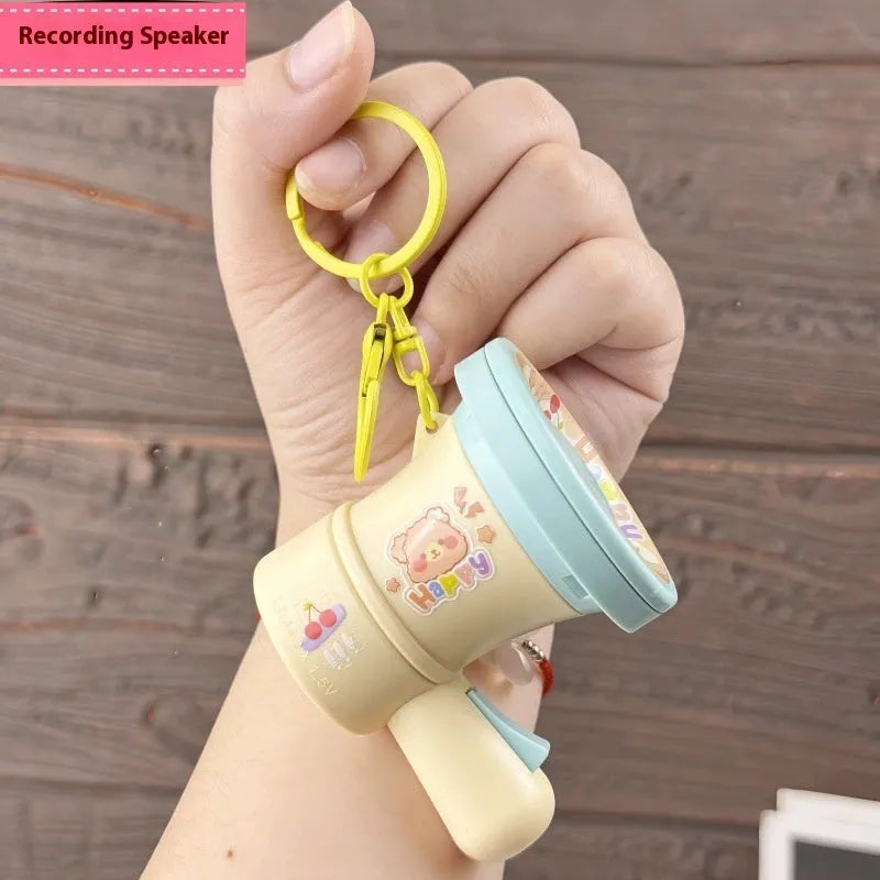 Green and yellow cartoon recording horn plastic keychain ornament with cute style design
