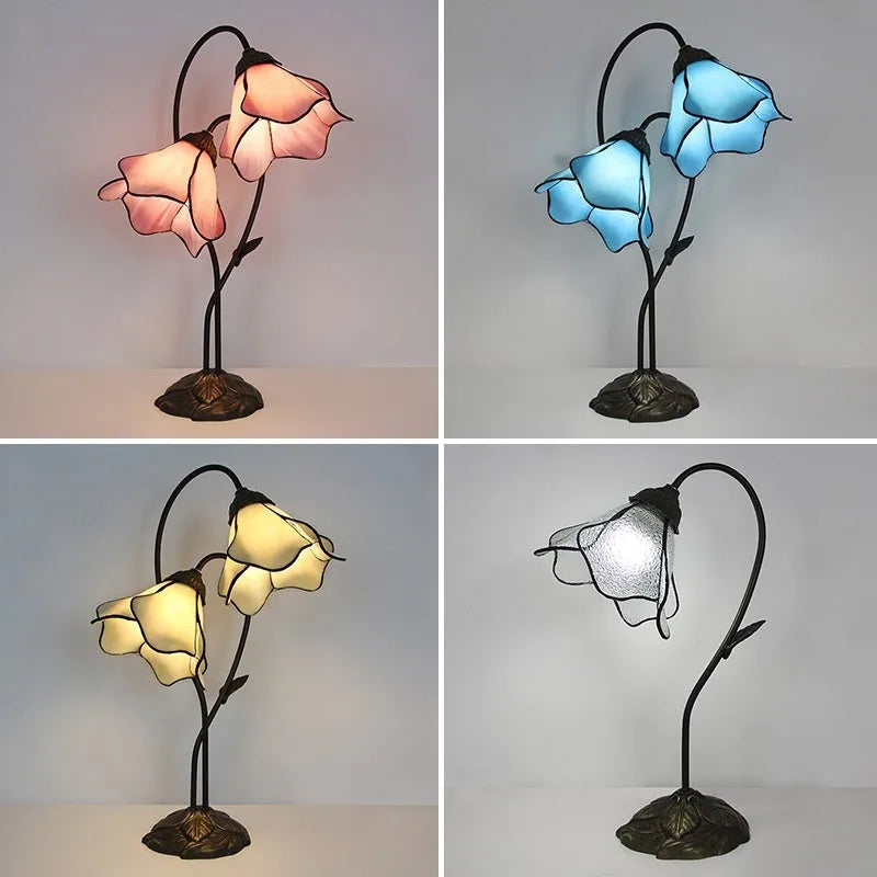 Retro American style desk lamp with lotus glass shade on wooden table.
