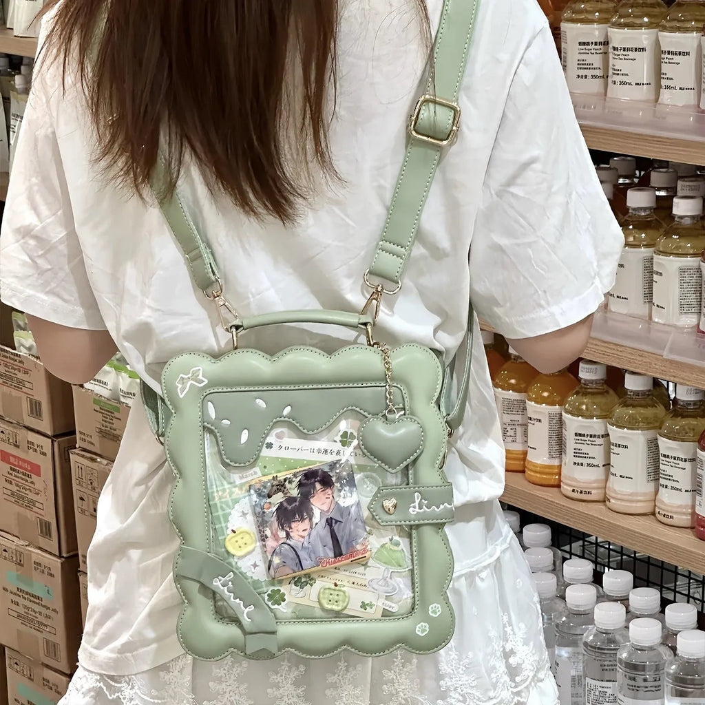 Cross-body shoulder bag in PU with horizontal square shape, open pocket, and single shoulder strap.