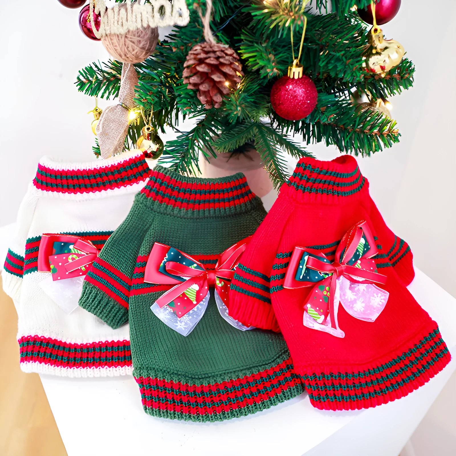 Red polyester knitted Christmas jumper for a dog, showing a simple pullover design.