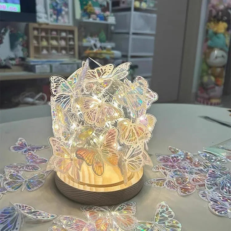 Butterfly design night light with glass shade on raw wood base, battery operated bedroom lamp