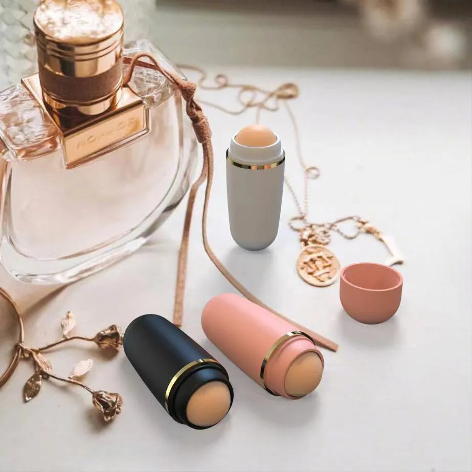 Portable volcanic stone oil absorbing ball in 3x8x2cm size for facial oil control, shown in white, black, and pink colours
