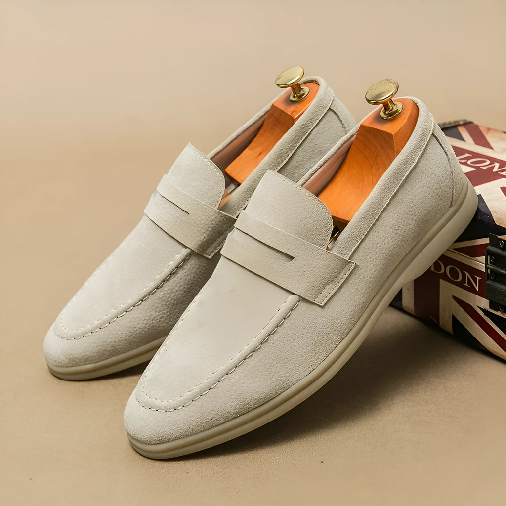 Men's beige, black, and khaki leather slip-on shoes with round toe and rubber sole