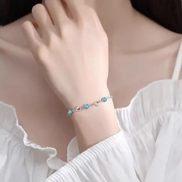 Blue electroplated geometric heart pendant necklace with matching bracelet jewellery set on copper chain