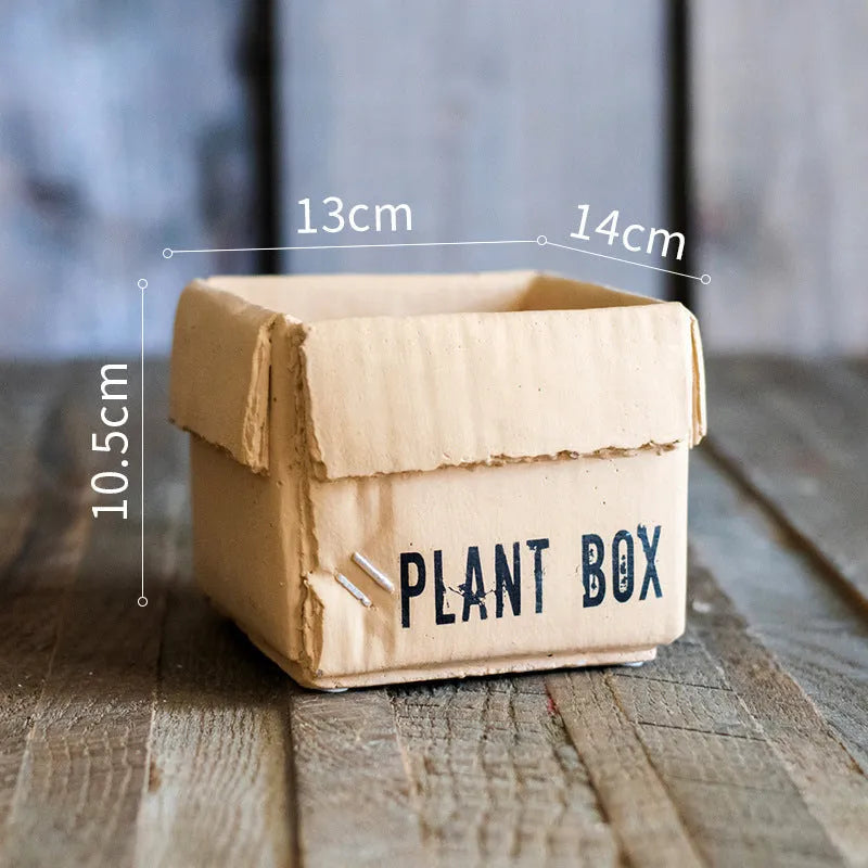 Cement brown paper box style flowerpot with bottom drainage holes for indoor planting