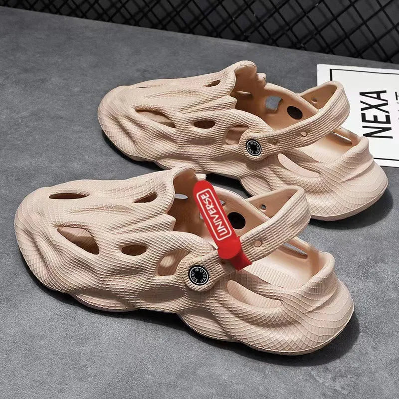 Grey closed-toe EVA coconut slippers on a beach background, showing frosted surface and injection moulded sole.