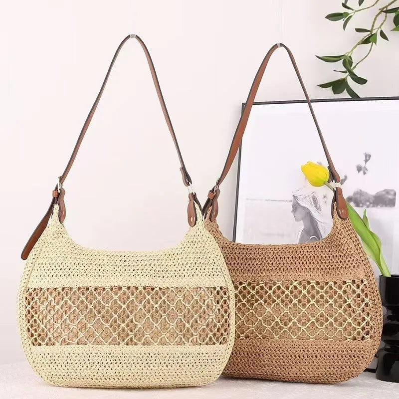 Women's khaki straw cross body bag with a square shape and outer pocket.