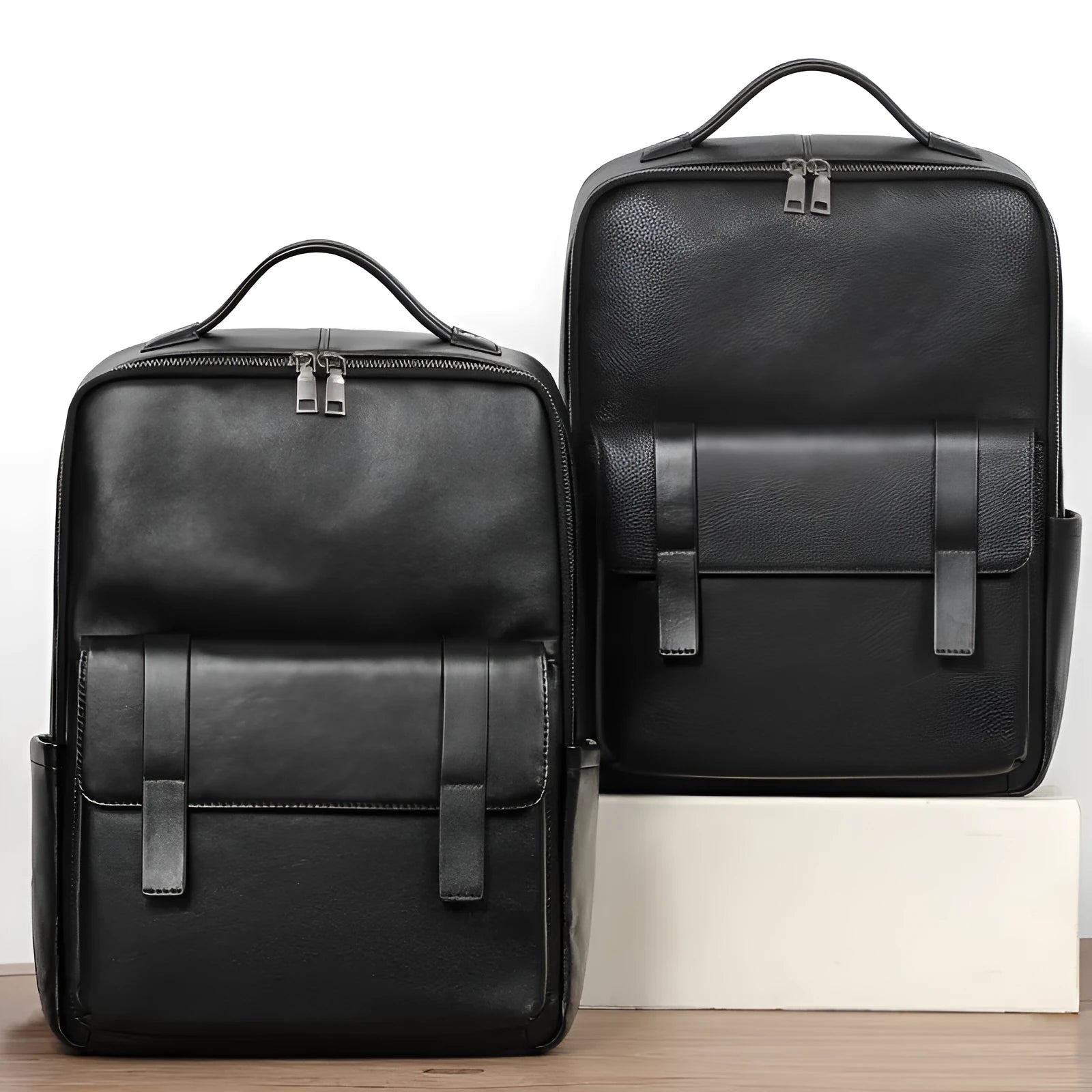 Men's black genuine leather computer backpack with 36-55 litre capacity and business styling