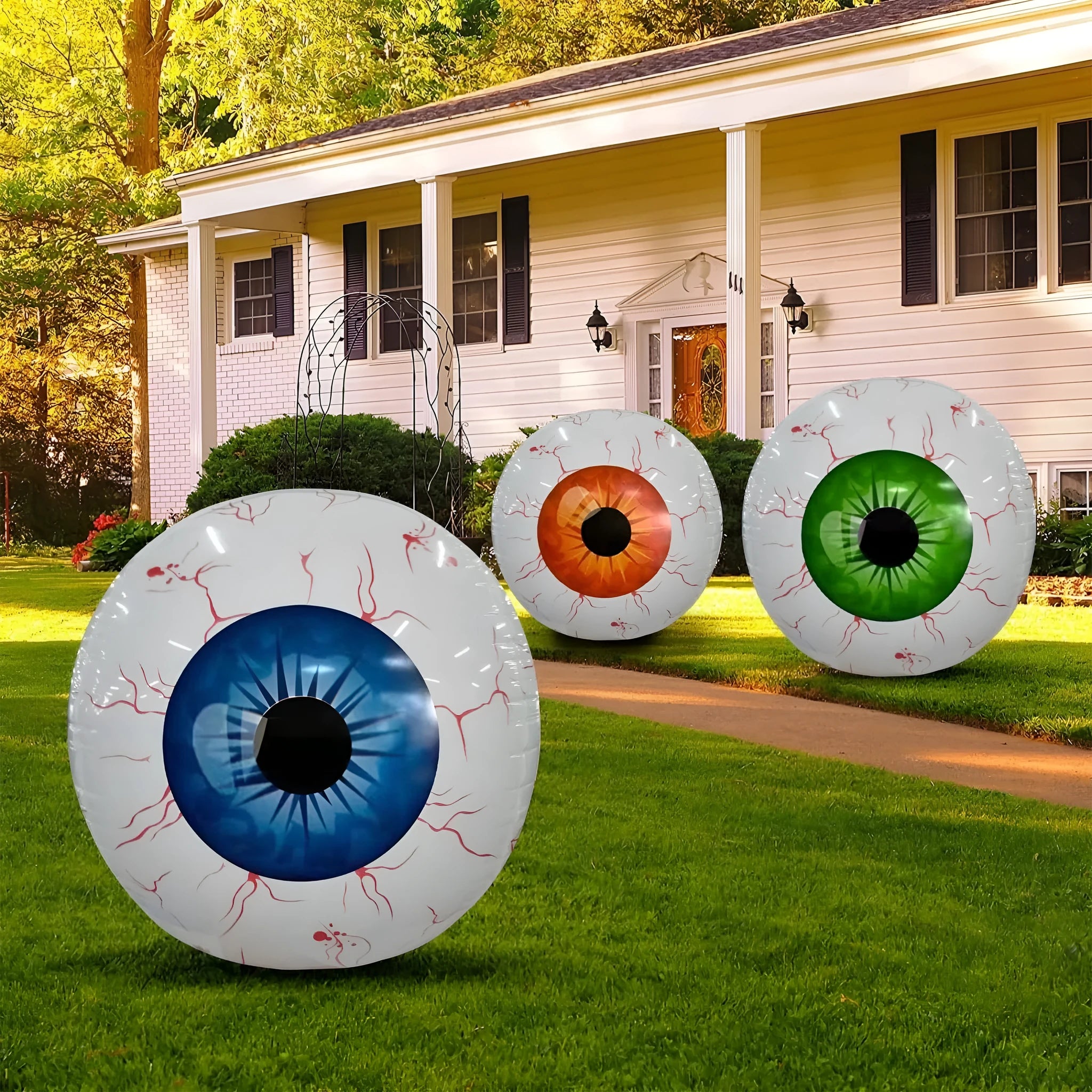 Green Halloween eyeball inflatable balloon with bloodshot pattern, shown inflated.
