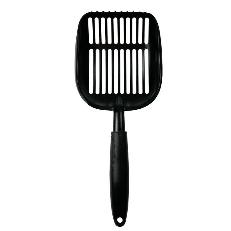 Alloy cat litter scoop with plastic handle on a cat litter box, showing cat face hole design for sifting.