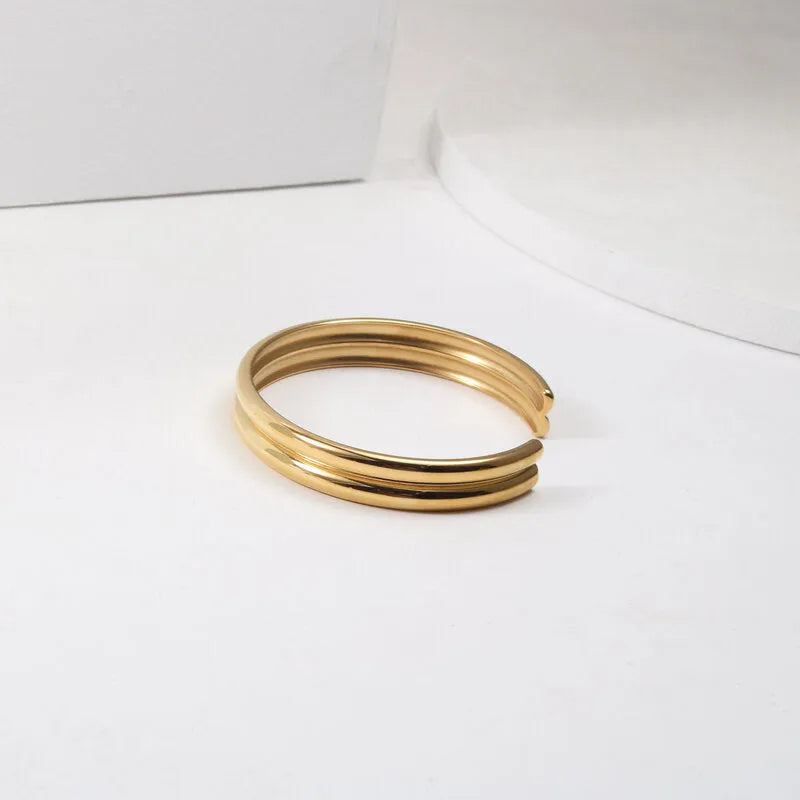 Double curved titanium steel bracelet for women, gold with pearl inlay, geometric style
