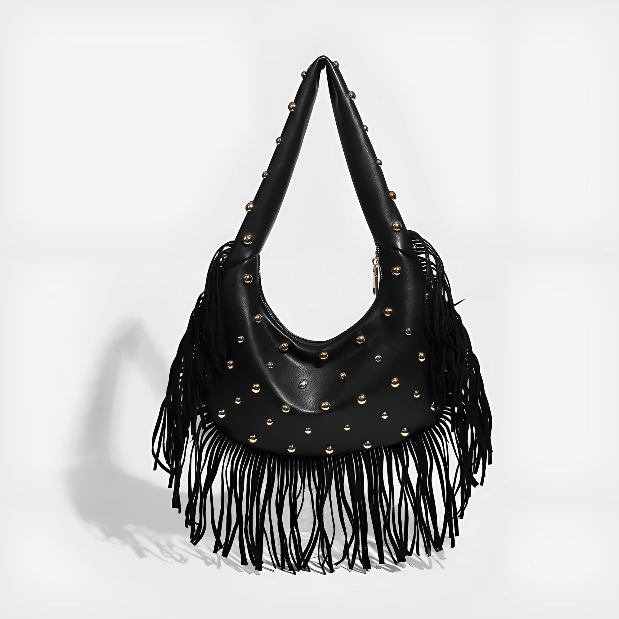 Retro tassel shoulder handbag in black with mobile phone compartment visible