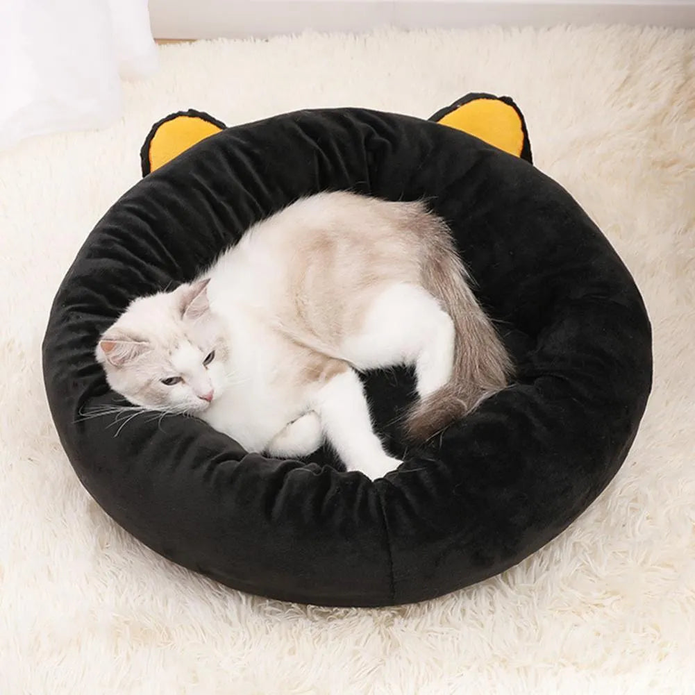 Black cat shape velvet pet nest bed with raised edges for cat head and neck support