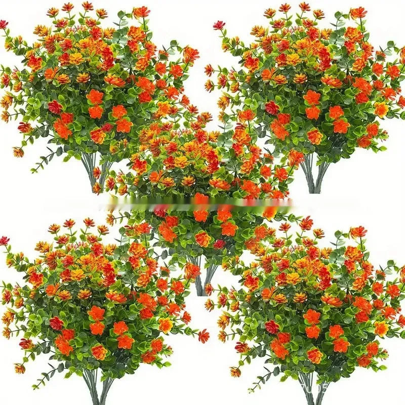 Artificial eucalyptus camellia plastic bouquet in mixed colours on white background