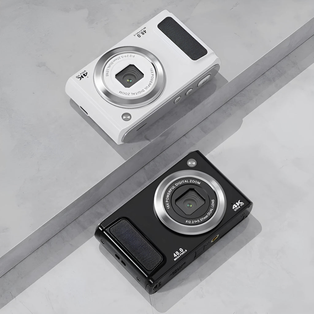 Entry-level 4K HD digital camera in black with front and rear dual lenses, compact ABS body on white background