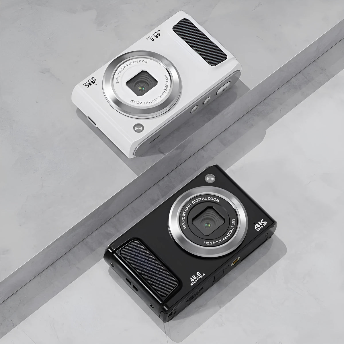 Entry-level 4K HD digital camera in black with front and rear dual lenses, compact ABS body on white background