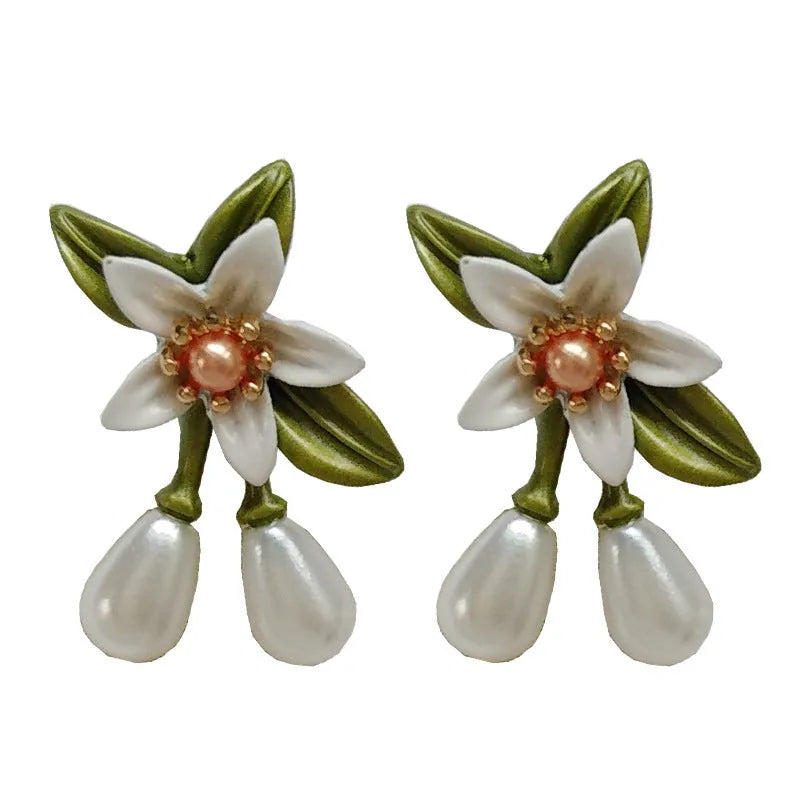 Sterling silver colour camellia flower earrings with needle studs and matching clip in contrast colours