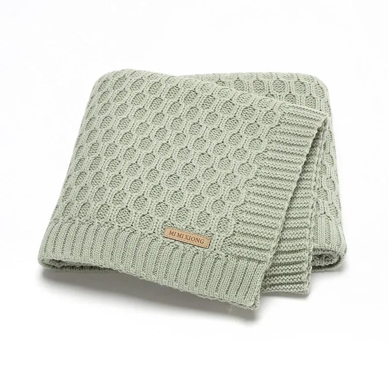 Solid colour infant hug blanket with three-dimensional lines texture showing 70×90cm dimensions