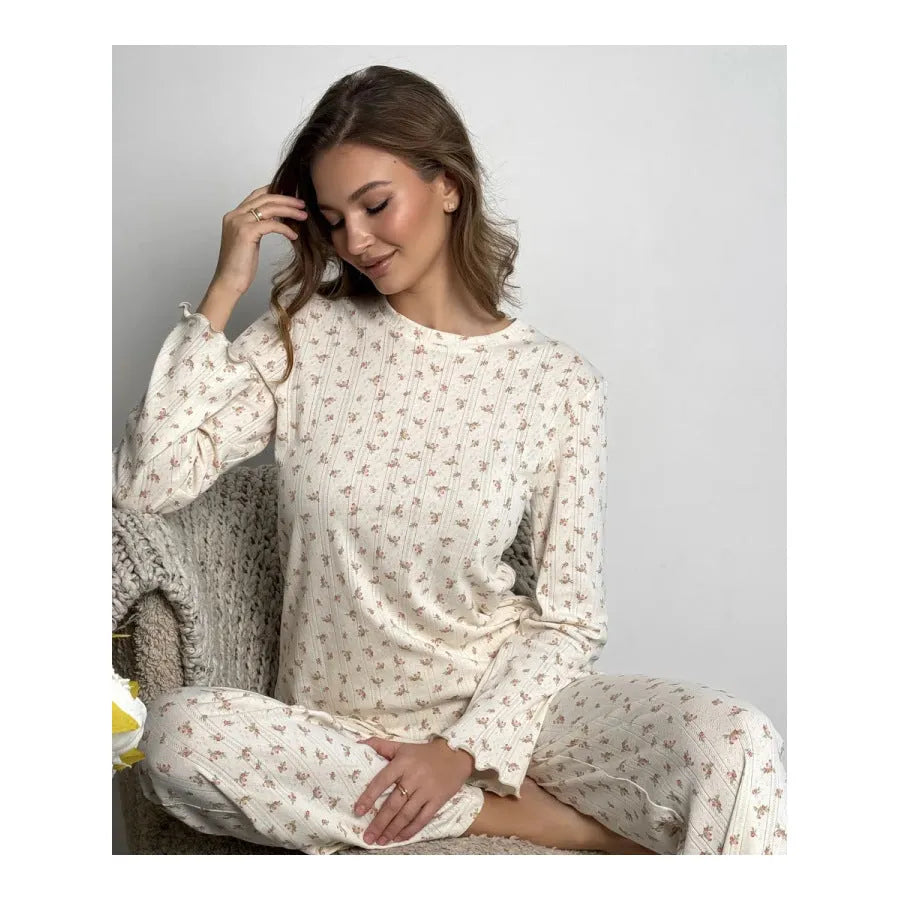 Women's white floral print lounge suit with bell sleeve top and wide-leg trousers