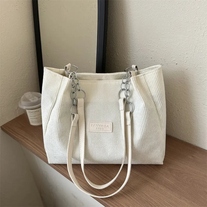 Corduroy one-shoulder tote handbag in square design with three-dimensional pocket