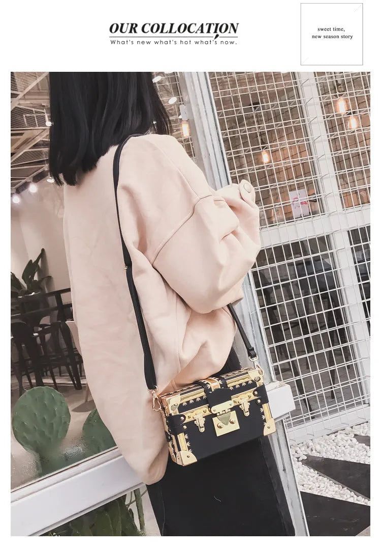 Black hard PU leather women's shoulder bag with flap design and single strap