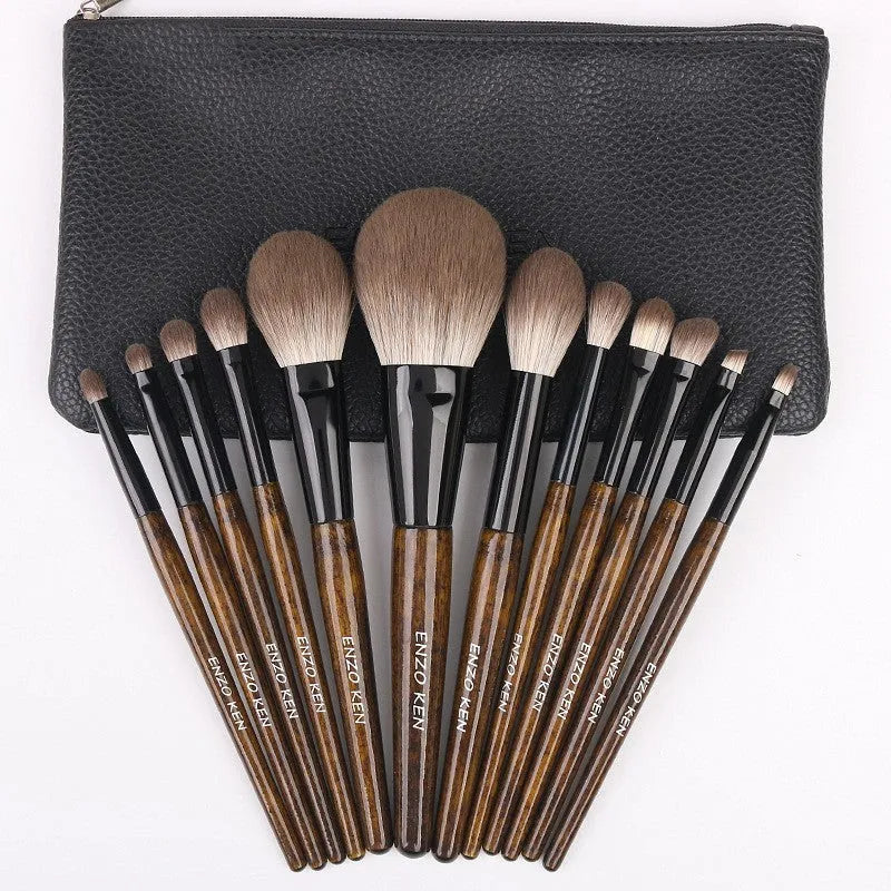 12-piece makeup brush set with wooden handles and a black PU storage bag.