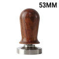 Black silicone coffee powder press pad with stainless steel base and aluminium handle