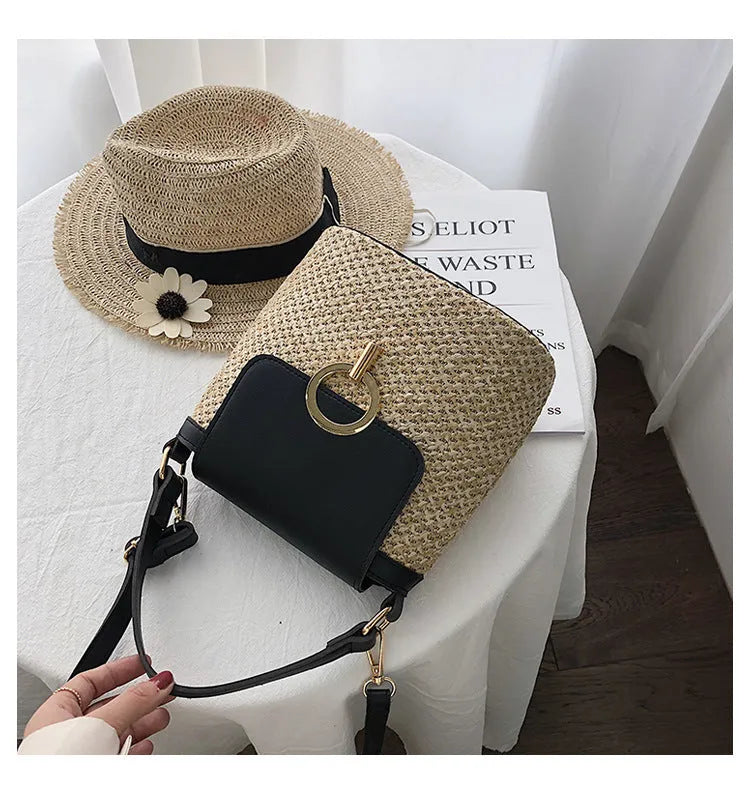 Women's straw woven bucket shoulder bag in black with cover flap, small size, polyester lining