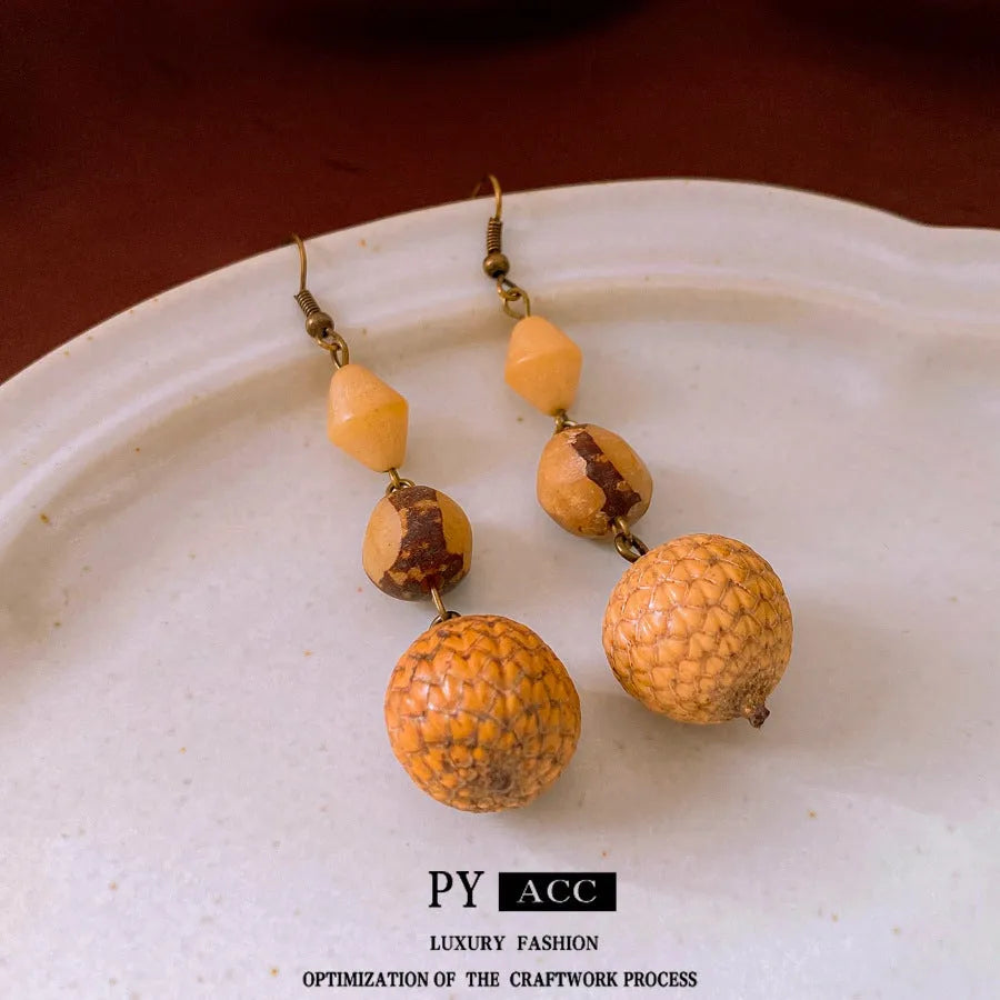 Resin fruit core tassel earrings in brown geometric round shape ethnic style for women