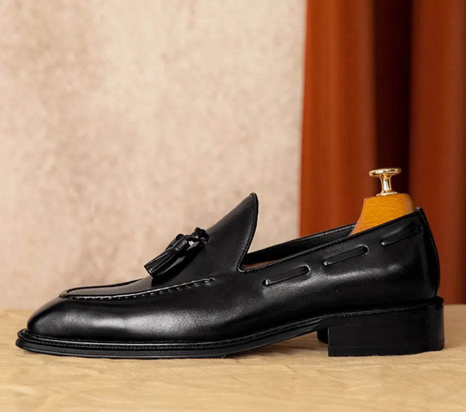 Men's genuine leather slip-on loafers with fringed detailing in black or brown