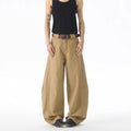 Men's brown straight-leg casual denim jeans with a loose fit and cardigan-style button fly.