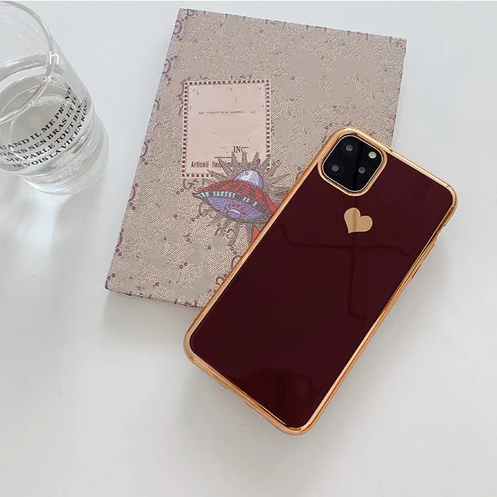 Solid colour TPU back cover phone case for iPhone, shown in blue, claret, pink, or green.