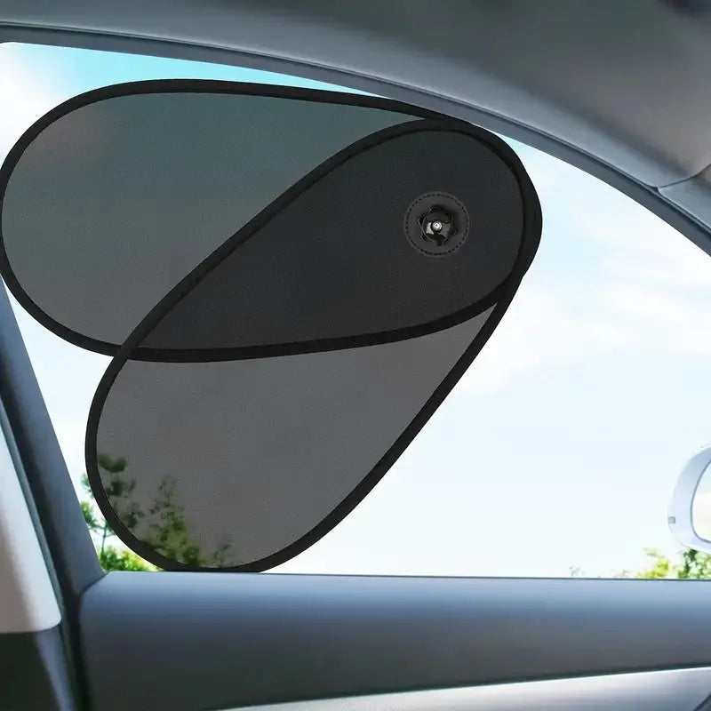 Black breathable car window shades with suction cups stretched across vehicle side window