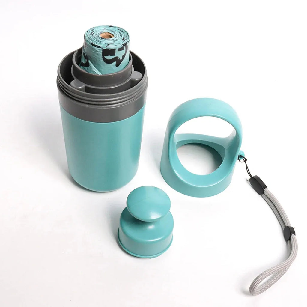 Blue plastic dog pooper scooper with claw mechanism and roll of waste bags