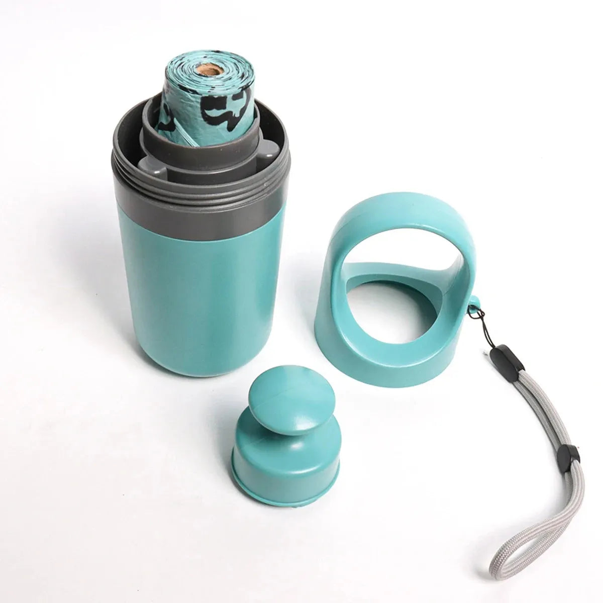 Blue plastic dog pooper scooper with claw mechanism and roll of waste bags