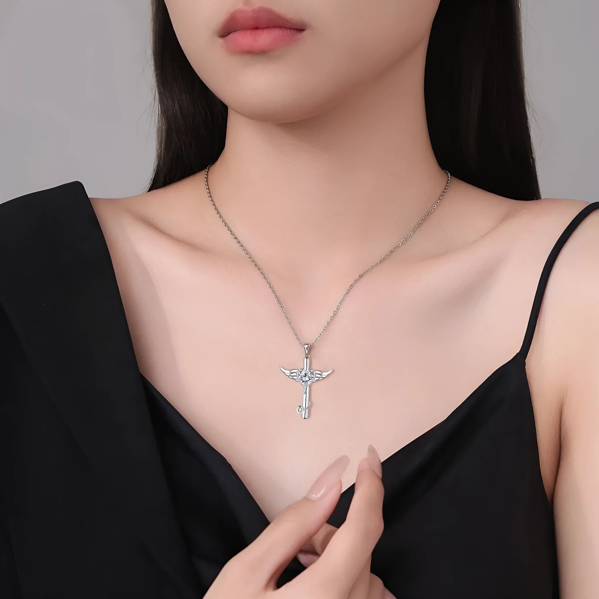 Women's copper necklace with stethoscope, angel wings and cross pendant in electroplated white diamond or red diamond finish