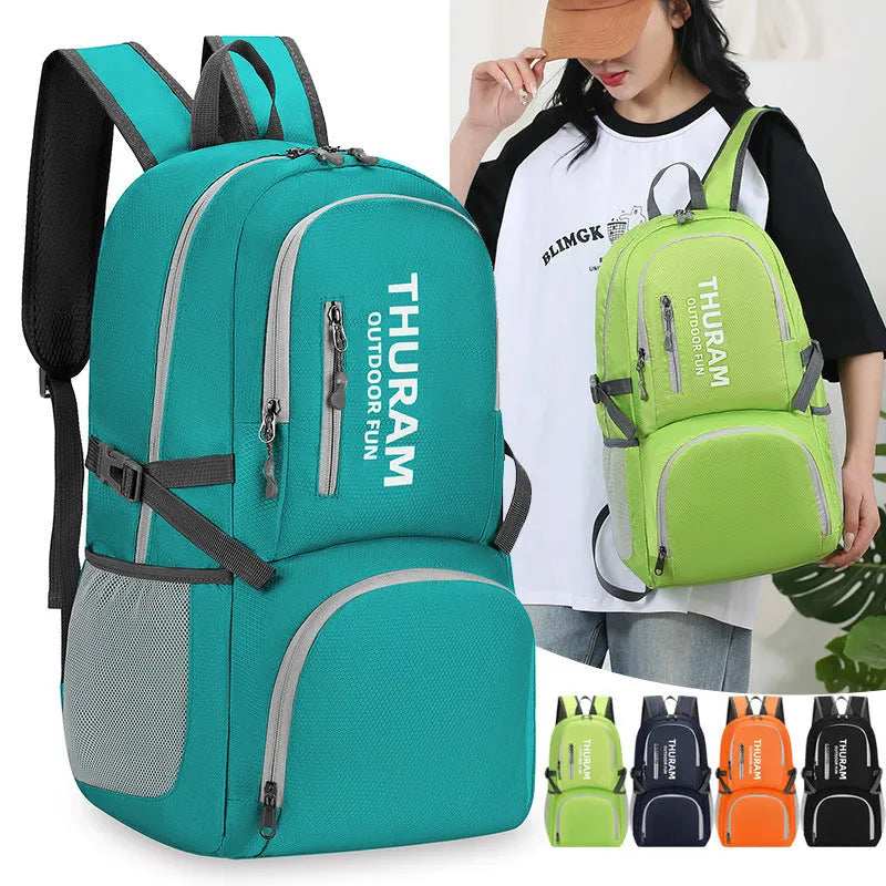 Outdoor folding rucksack in dark blue with air pillow belt system showing 20-35 litre capacity