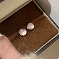 Copper four-claw chalcedony stud earrings in geometric round shape with national fashion style