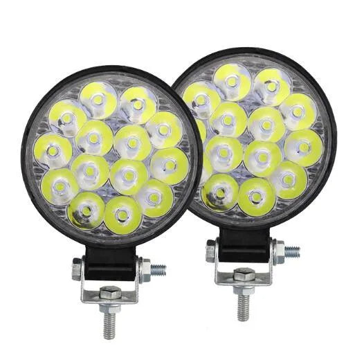 Round white LED work light with aluminium housing for vehicle mounting