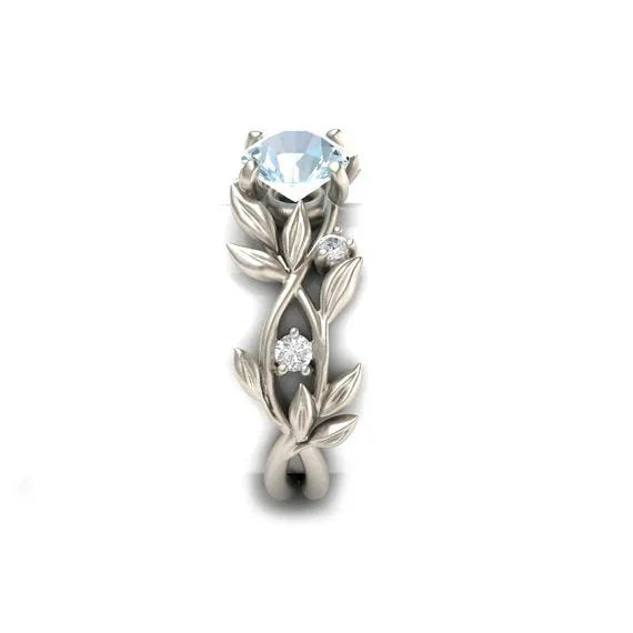 Zircon leaf engagement ring in electroplated metal, available in five colours and sizes 6 to 11