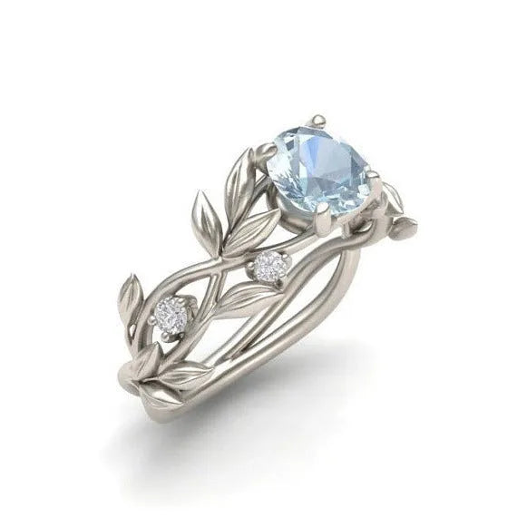 Zircon leaf engagement ring in electroplated metal, available in five colours and sizes 6 to 11