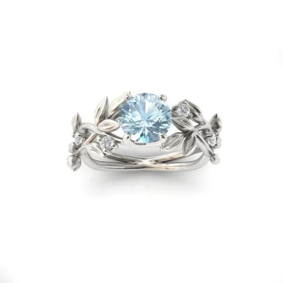 Zircon leaf engagement ring in electroplated metal, available in five colours and sizes 6 to 11
