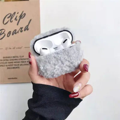 Simple Lamb hard plastic AirPods cover with plush interior in blue, shown next to brown and grey options.