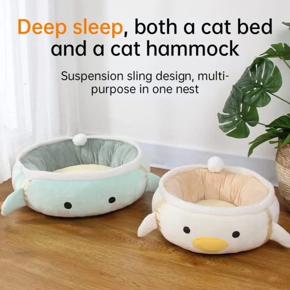 Green dinosaur chick design cat bed shown both flat and hanging, for small cats and dogs.