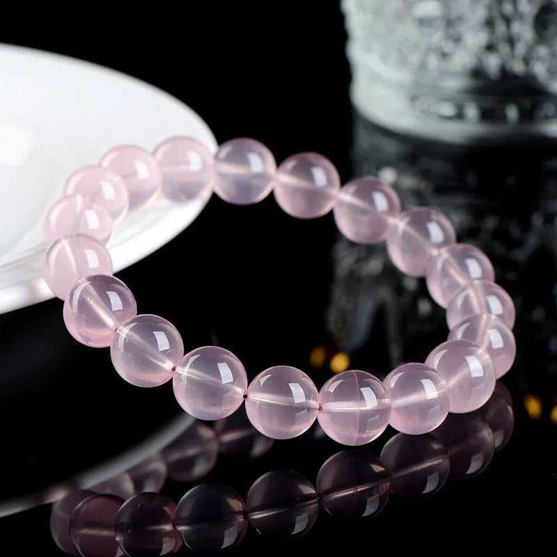 Natural starlight crystal round beads women's bracelet in polished pink crystal with multiple sizing options