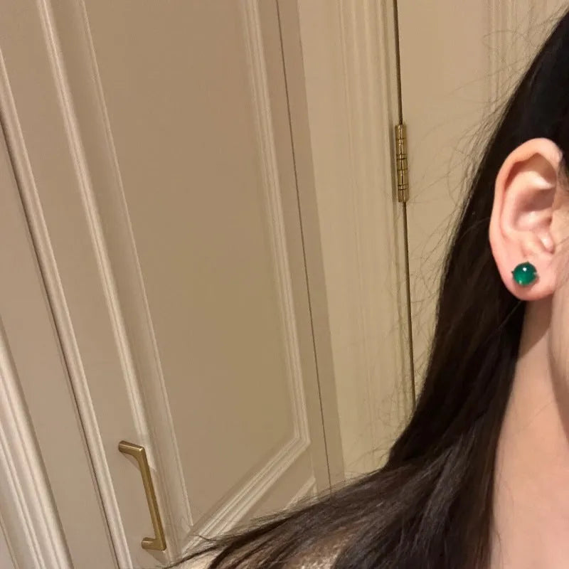 Copper four-claw chalcedony stud earrings in geometric round shape with national fashion style