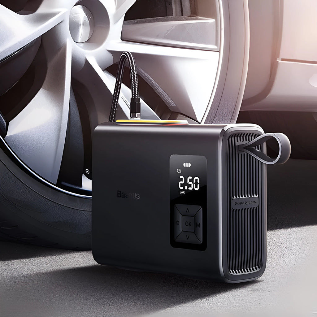 Black portable car tyre inflator with LED light display showing 6000mAh battery capacity