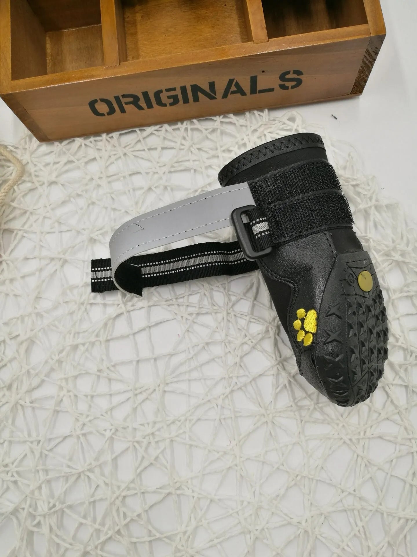 Black waterproof dog shoes with non-slip PVC sole, adjustable fuzzy belt