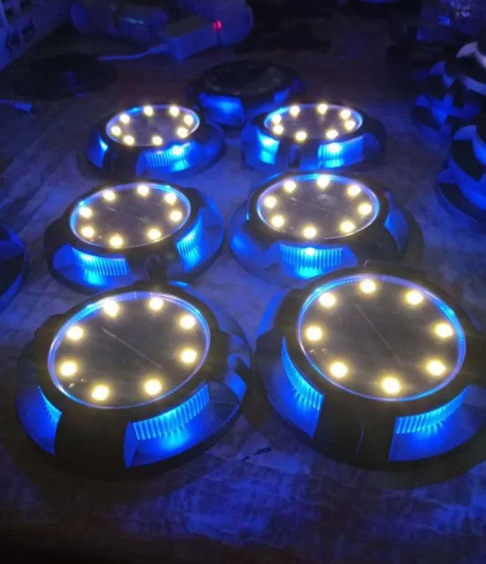Black LED solar underground lawn light with seven colour cold white light, 11x4x13cm