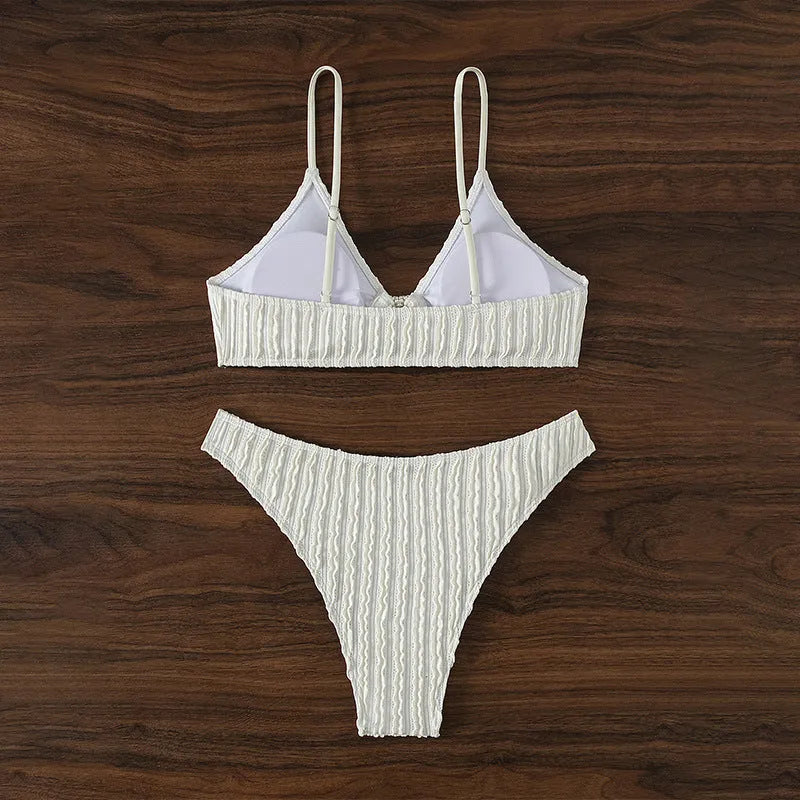 White women's V-neck beach split swimsuit with matching shorts